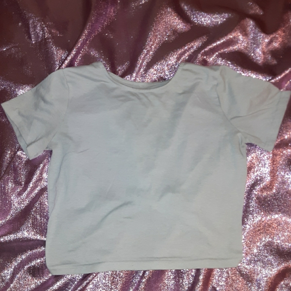 White crop top tee with open back.